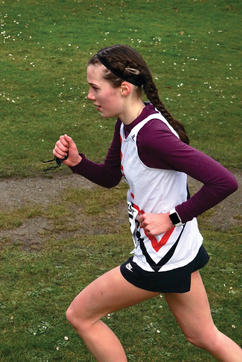 Senior Gina Brown of East Jefferson cross country team, runs against the competition from Sequim.